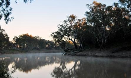 The sun rises over the Barwon river in Brewarrina