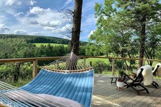 Right on the EnglandWales border this handcrafted cabin is part of a working sheep farm where Whiskey the dog keeps the...